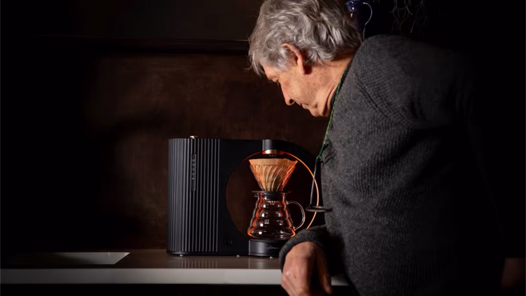 Colin Hall, Co-Founder of Cupper’s Journey, watching the Hikaru Precision Brewer